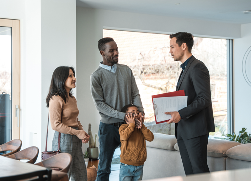 Realtor with family in a living room